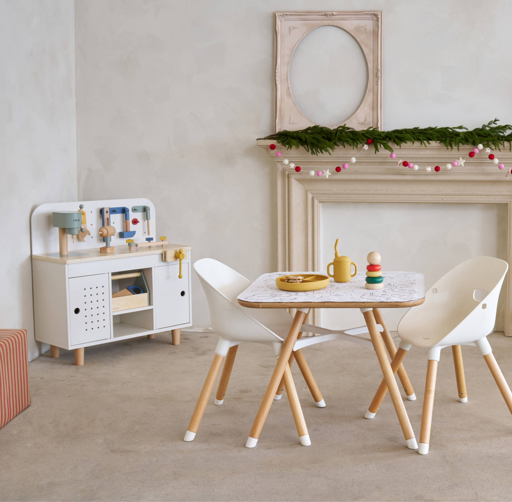 The Play Kit and Workbench in a room with holiday decorations